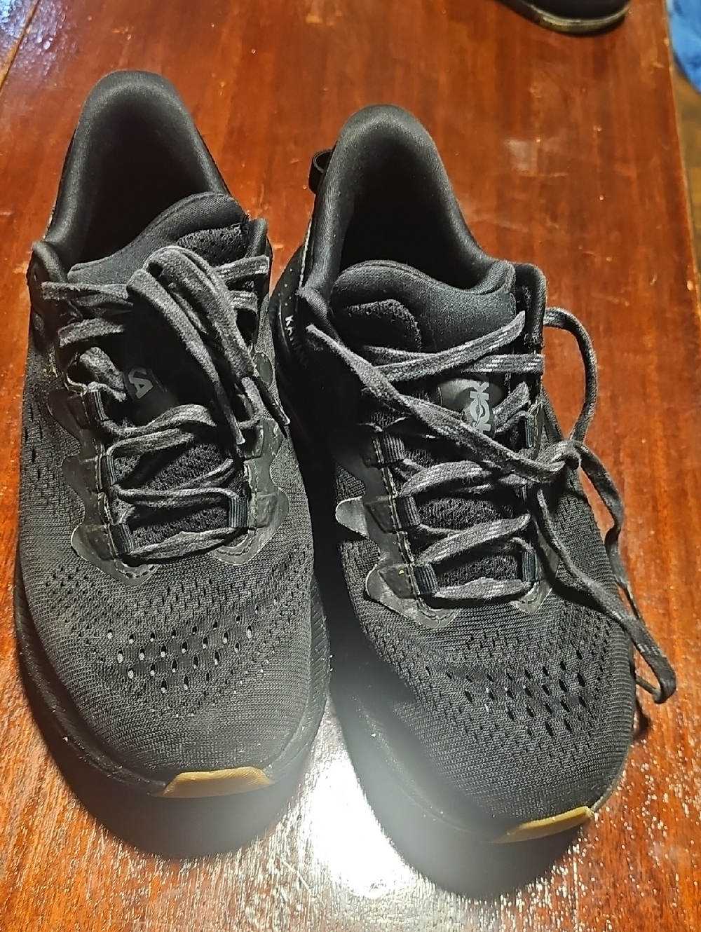 Hoka Men's Black Athletic Running Shoes with Subtle Tan Trim
